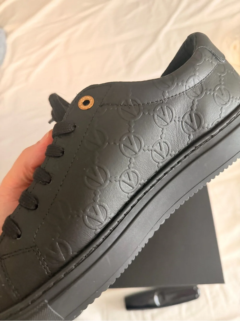 Valentino Men’s Black Leather Low-Top Sneakers with Gold Eyelets